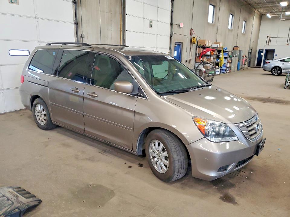 2010 Honda Odyssey VIN 5FNRL3H74AB033359 COPART salvage auction — MECHANICAL, Mn - Cert Of Title-Prior Salvage, sold $625 on 2026-07-09 (photo 4)