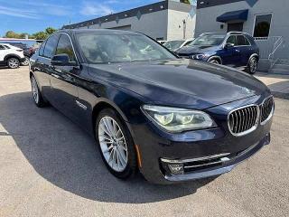 2015 BMW 7er VIN WBAYB6C5XFD965910 COPART salvage auction — DAMAGE HISTORY, Fl - Cert Of Title Slvg Rebuildable (P), sold $6,700 on 2026-07-28 (photo 4)
