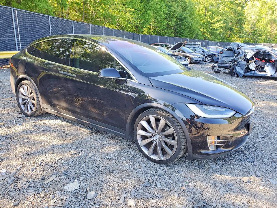 2016 Tesla Model x VIN 5YJXCBE24GF014605 COPART salvage auction — MINOR DENT/SCRATCHES, MD - CERT OF SALVAGE > 75% DAMAGE, sold $8,200 on 2026-07-21 (photo 4)