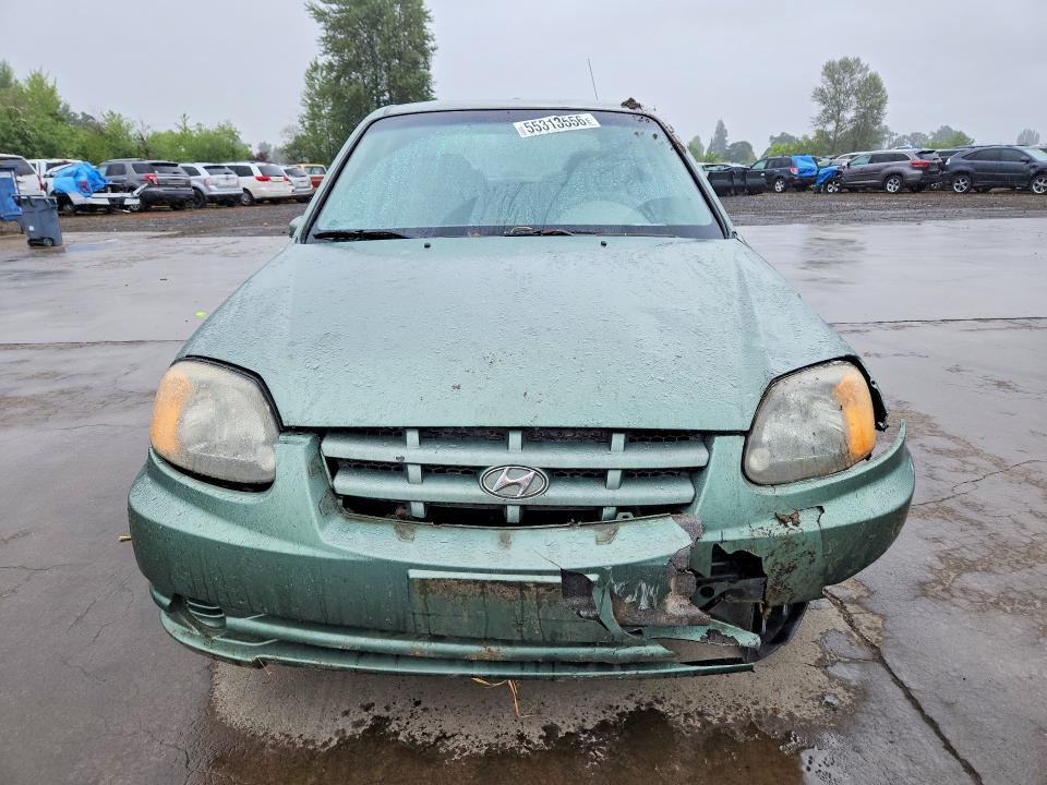 2005 Hyundai Accent VIN KMHCG45C35U585400 COPART salvage auction — ROLLOVER, Or - Salvage Title Certificate, sold $150 on 2026-07-27 (photo 5)