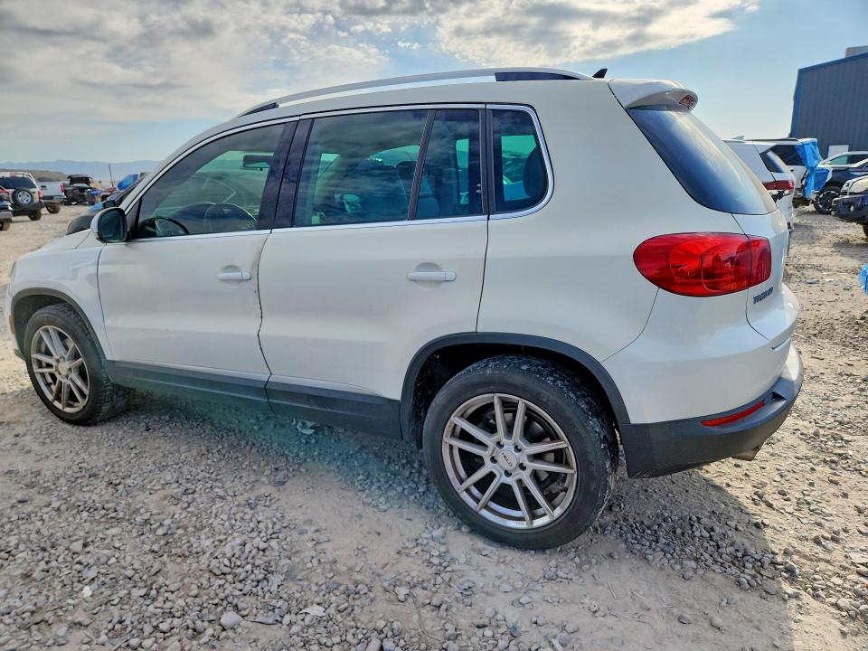 2013 Volkswagen Tiguan VIN WVGAV3AXXDW560464 COPART salvage auction — MINOR DENT/SCRATCHES, Mt - Certificate Of Title, sold $350 on 2026-07-31 (photo 2)