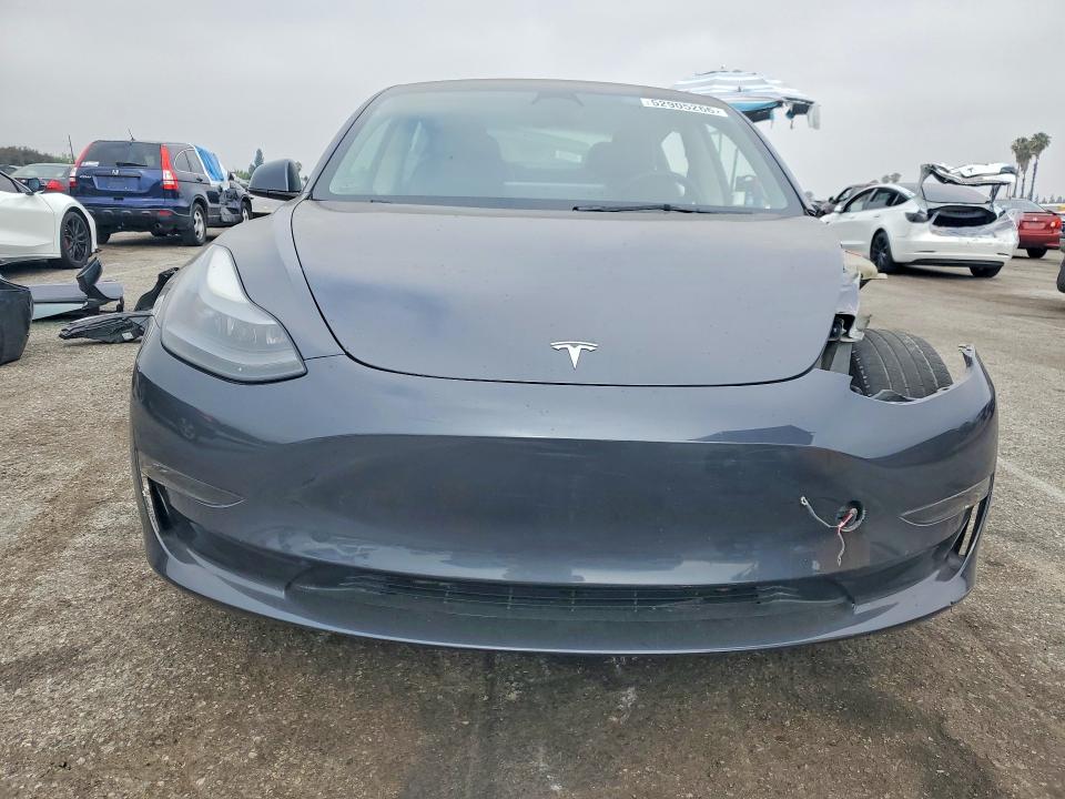 2023 Tesla Model 3 VIN 5YJ3E1EAXPF429115 COPART salvage auction — SIDE, ID - SALVAGE CERTIFICATE OF TITLE, sold $6,700 on 2026-07-31 (photo 5)