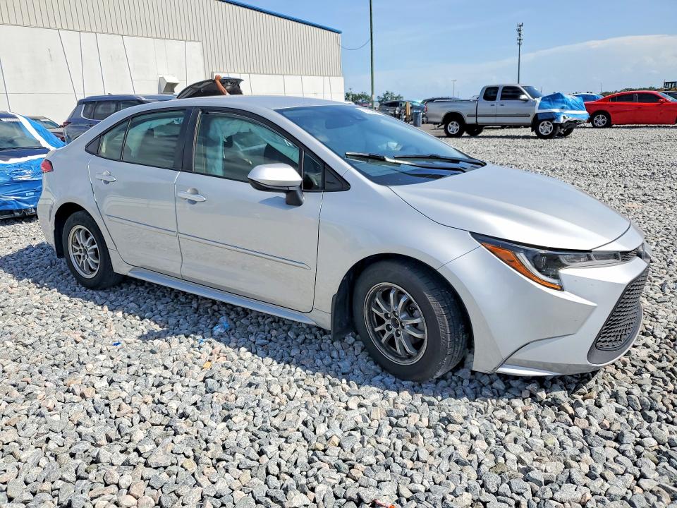 2022 Toyota Corolla VIN JTDEAMDE4NJ051454 COPART salvage auction — SIDE, Fl - Cert Of Title Slvg Rebuildable, sold $5,400 on 2026-07-08 (photo 4)