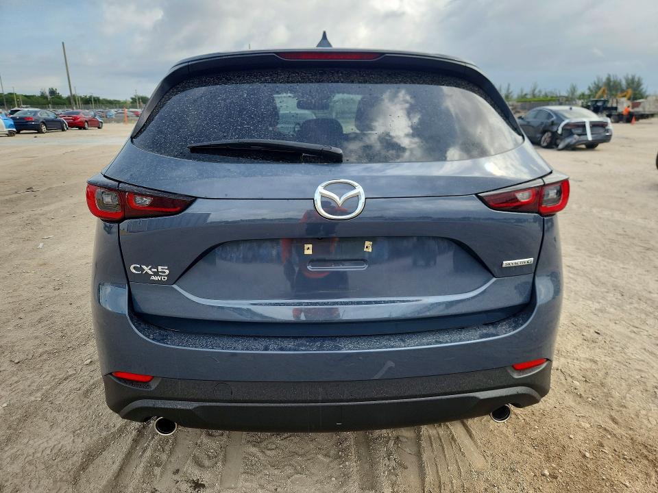 2025 Mazda Cx-5 VIN JM3KFBCM8S0611597 COPART salvage auction — SIDE, Fl - Cert Of Title Slvg Rebuildable, sold $12,200 on 2026-07-16 (photo 6)