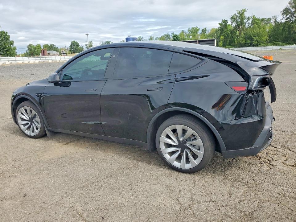 2026 Tesla Model y VIN 7SAYGDEE6TF567123 COPART salvage auction — REAR END, Or - Salvage Title Certificate, sold $18,100 on 2026-07-13 (photo 2)