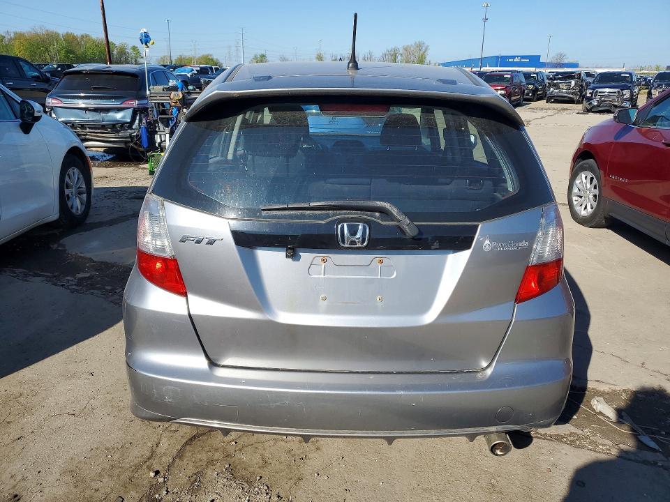 2010 Honda Fit VIN JHMGE8H46AS027665 COPART salvage auction — MINOR DENT/SCRATCHES, MI - CERTIFICATE OF TITLE, sold $2,000 on 2026-07-14 (photo 6)