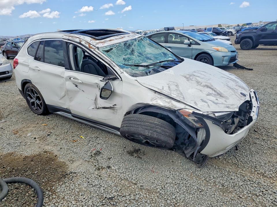 2019 BMW X1 VIN WBXHU7C59K5L11202 COPART salvage auction — ROLLOVER, Ca - Salvage Certificate, sold $700 on 2026-07-02 (photo 4)