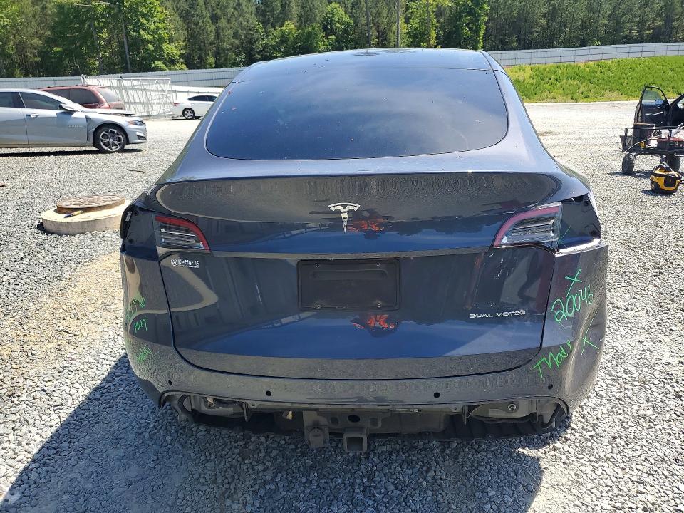 2021 Tesla Model y VIN 5YJYGDEE1MF140656 COPART salvage auction — REAR END, NC - SALVAGE CERTIFICATE OF TITLE, sold $825 on 2026-07-30 (photo 6)