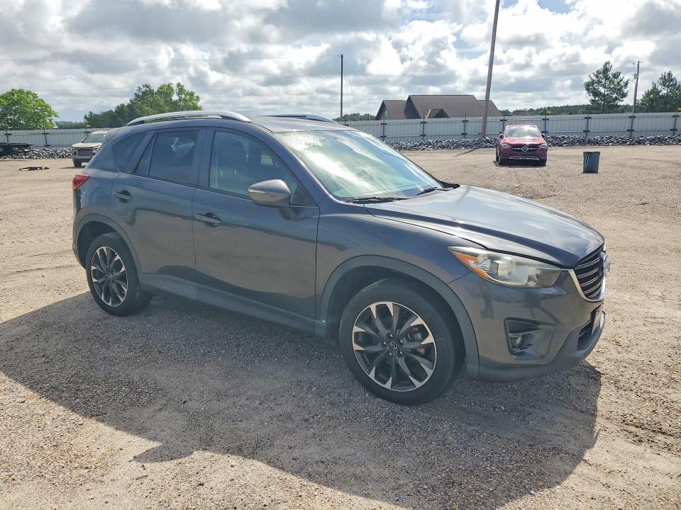 2016 Mazda Cx-5 VIN JM3KE4DY8G0834536 COPART salvage auction — NORMAL WEAR, Fl - Certificate Of Title, sold $8,200 on 2026-07-07 (photo 4)