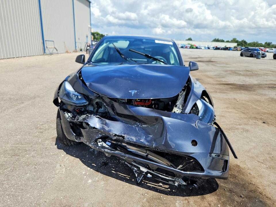 2025 Tesla Model y VIN 7SAYGDED5SA372181 COPART salvage auction — FRONT END, Fl - Certificate Of Destruction, sold $9,500 on 2026-07-20 (photo 5)