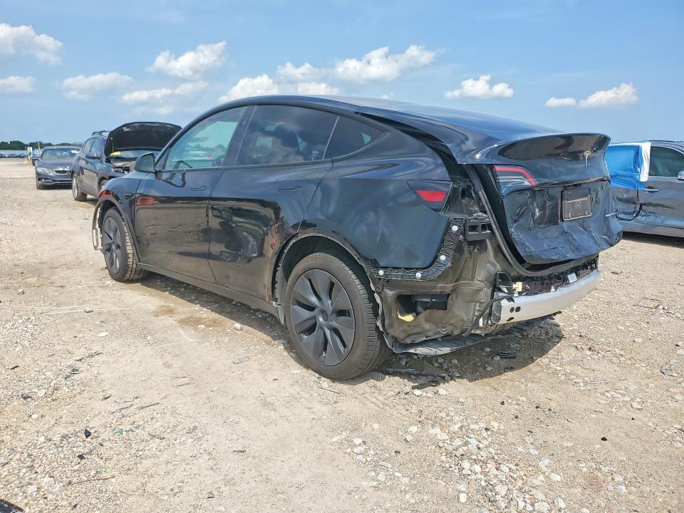 2025 Tesla VIN 7SAYGDEE9SA369468 COPART salvage auction — REAR END, Tx - Salvage Vehicle Title, sold $13,200 on 2026-07-03 (photo 2)