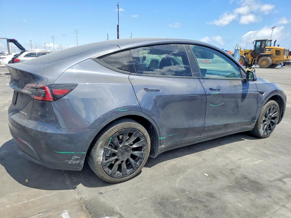 2023 Tesla Model y VIN 7SAYGDEE8PA113412 COPART salvage auction — MINOR DENT/SCRATCHES, Ca - Salvage Certificate, sold $14,100 on 2026-07-15 (photo 3)