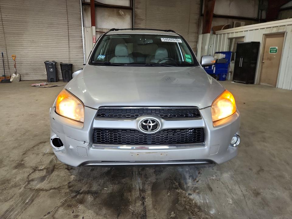 2010 Toyota Rav4 VIN JTMDF4DV8AD033447 COPART salvage auction — SIDE, Id - Salvage Certificate Of Title, sold $3,350 on 2026-07-15 (photo 5)