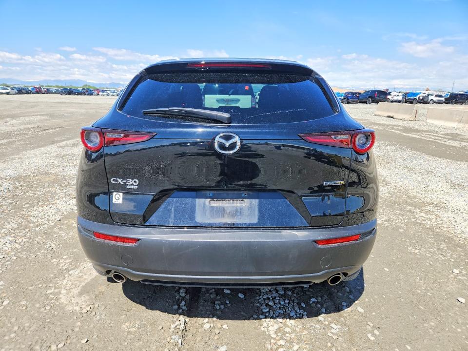 2021 Mazda VIN 3MVDMBCL1MM312028 COPART salvage auction — FRONT END, Wy - Dis/Dlr/Exp Only Salvage Title, sold $4,900 on 2026-08-29 (photo 6)