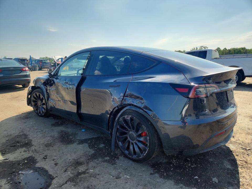 2025 Tesla Model y VIN 7SAYGDEF7SA350930 COPART salvage auction — SIDE, Va - Cert Of Title - Salvage, sold $11,800 on 2026-07-04 (photo 2)