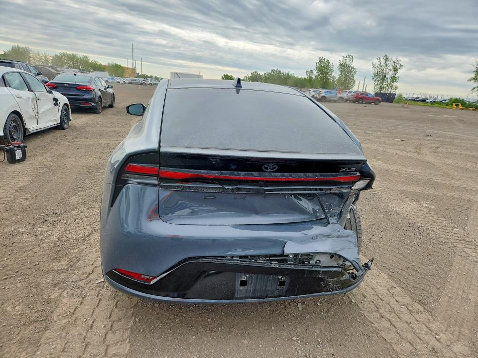 2024 Toyota Prius VIN JTDADABU1R3014841 COPART salvage auction — REAR END, Qc - Gravement Accidente, sold $9,000 on 2026-07-14 (photo 6)