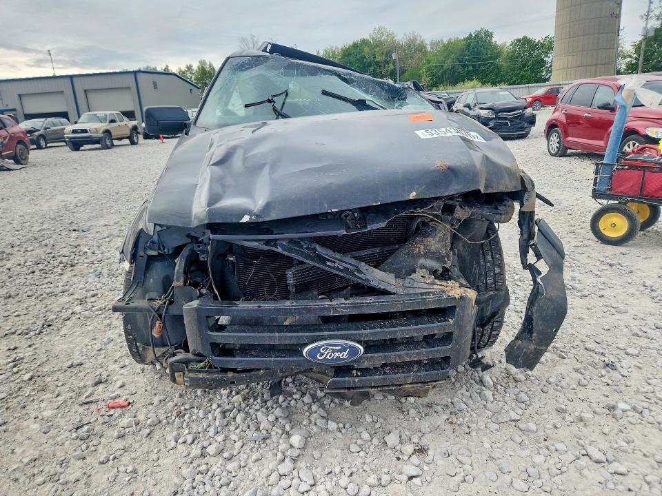 2012 Ford VIN 1FMJU2A5XCEF27657 COPART salvage auction — ALL OVER, MI - CERTIFICATE OF TITLE, sold $575 on 2026-07-09 (photo 5)