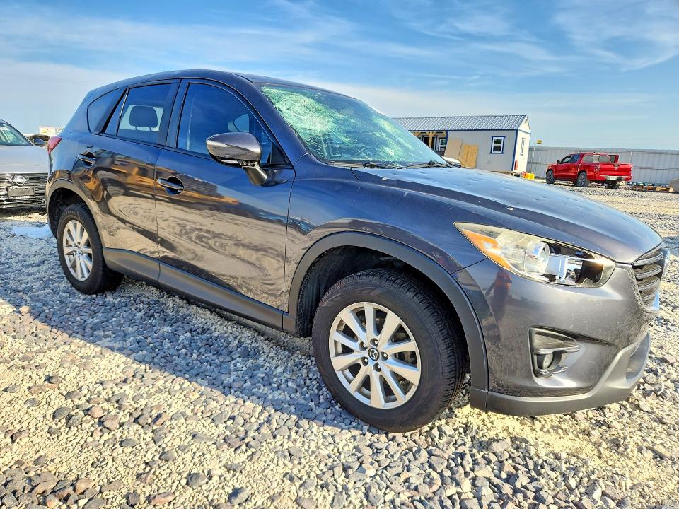 2016 Mazda Cx-5 VIN JM3KE4CY2G0782175 COPART salvage auction — HAIL, Mo - Salvage Certificate Of Title, sold $2,850 on 2026-07-27 (photo 4)
