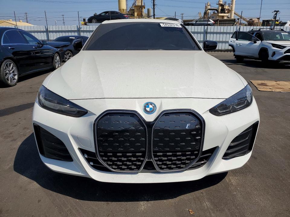 2024 BMW VIN WBY43AW06RFS63074 COPART salvage auction — REAR END, Ca - Salvage Certificate, sold $17,400 on 2026-07-29 (photo 5)