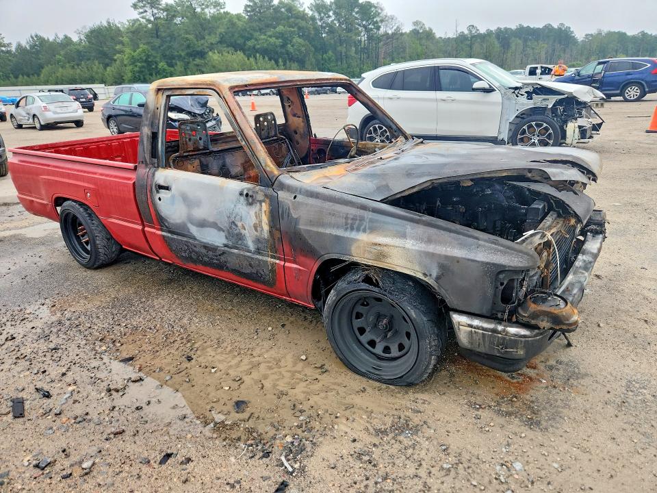 1987 Toyota Pickup VIN JT4RN50RXH0292255 COPART salvage auction — ENGINE BURN, Sc - Non-Reb & Rem Salvage Title, sold $350 on 2026-07-27 (photo 4)