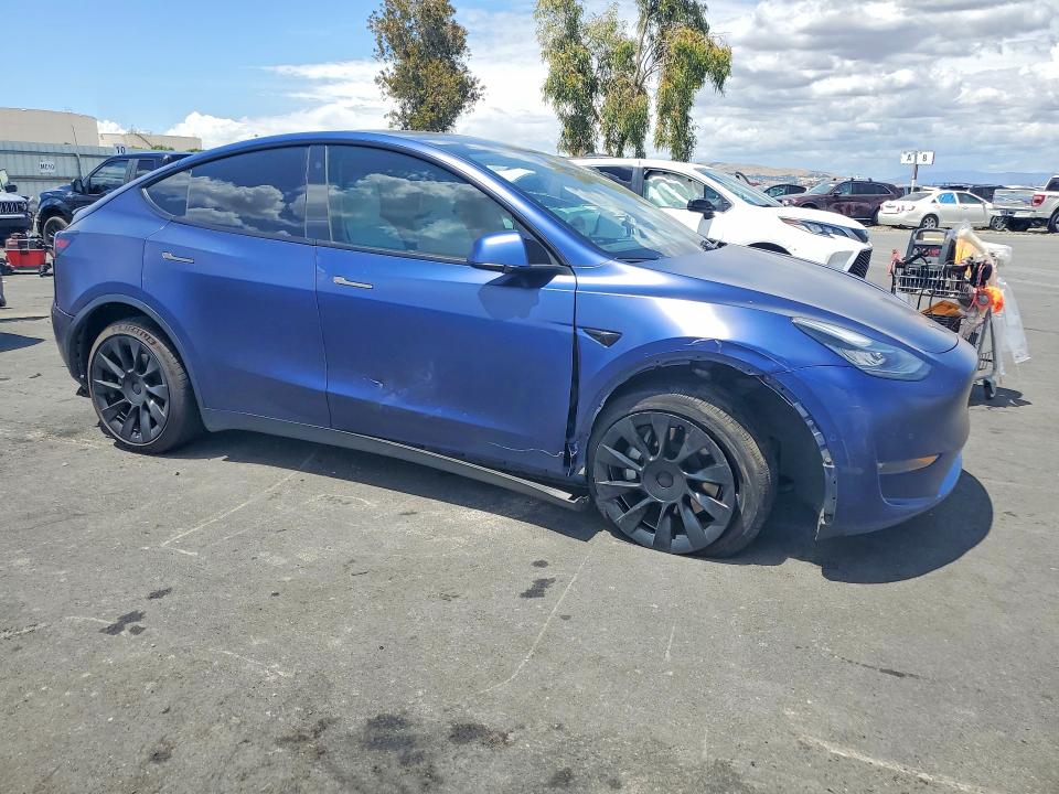 2022 Tesla Model y VIN 7SAYGDEE6NF339593 COPART salvage auction — SIDE, Ca - Salvage Certificate, sold $5,700 on 2026-07-08 (photo 4)