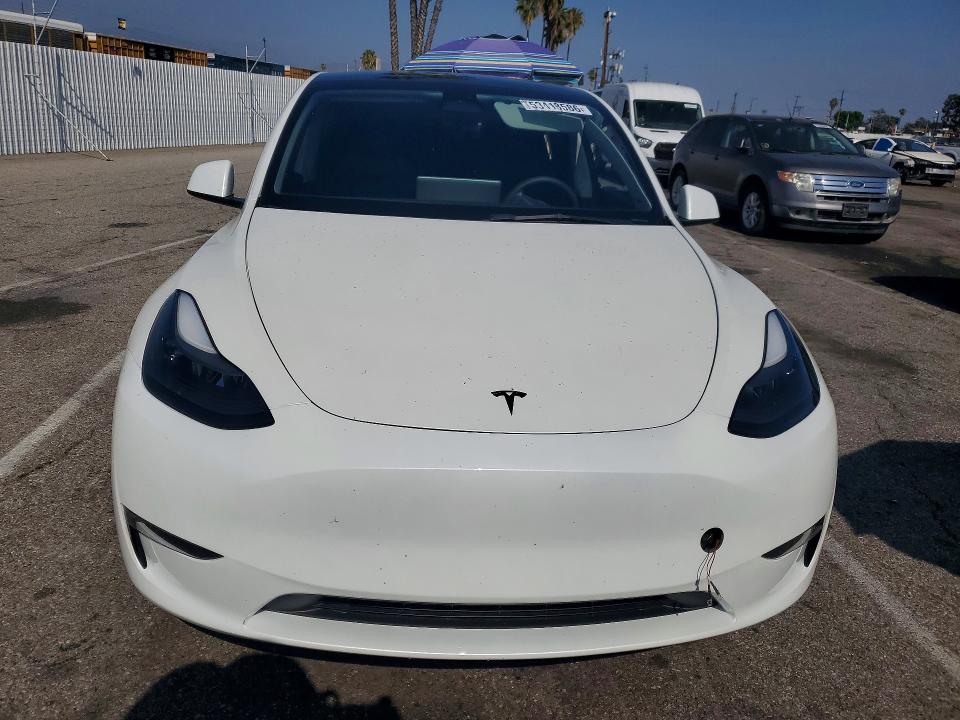 2023 Tesla Model y VIN 7SAYGDEF4PF762717 COPART salvage auction — SIDE, Ca - Salvage Certificate, sold $13,000 on 2026-07-31 (photo 5)