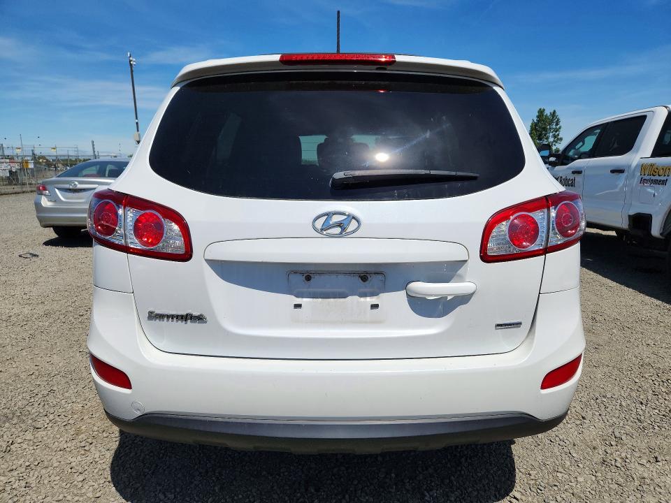 2012 Hyundai Santa fe VIN 5XYZHDAG1CG132346 COPART salvage auction — SIDE, Or - Salvage Title Certificate, sold $775 on 2026-07-07 (photo 6)