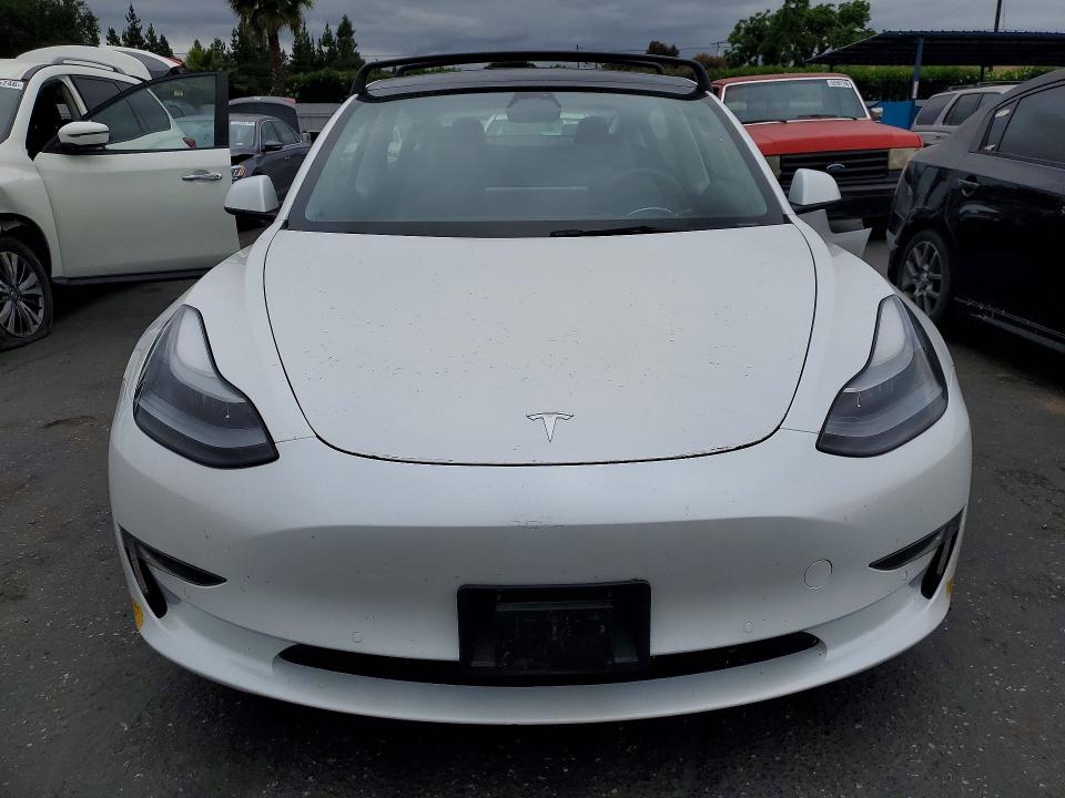 2022 Tesla Model 3 VIN 5YJ3E1EBXNF180630 COPART salvage auction — REAR END, Ca - Salvage Certificate, sold $8,800 on 2026-07-14 (photo 5)