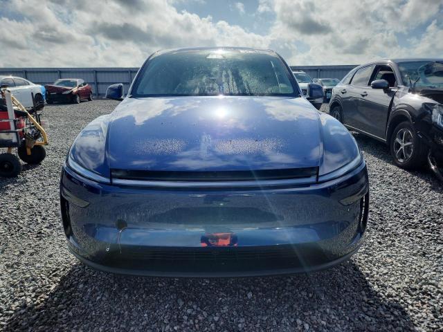 2026 Tesla Model y VIN 7SAYGDED5TF524612 COPART salvage auction — SIDE, Fl - Cert Of Title Slvg Rebuildable, sold $22,300 on 2026-07-10 (photo 5)