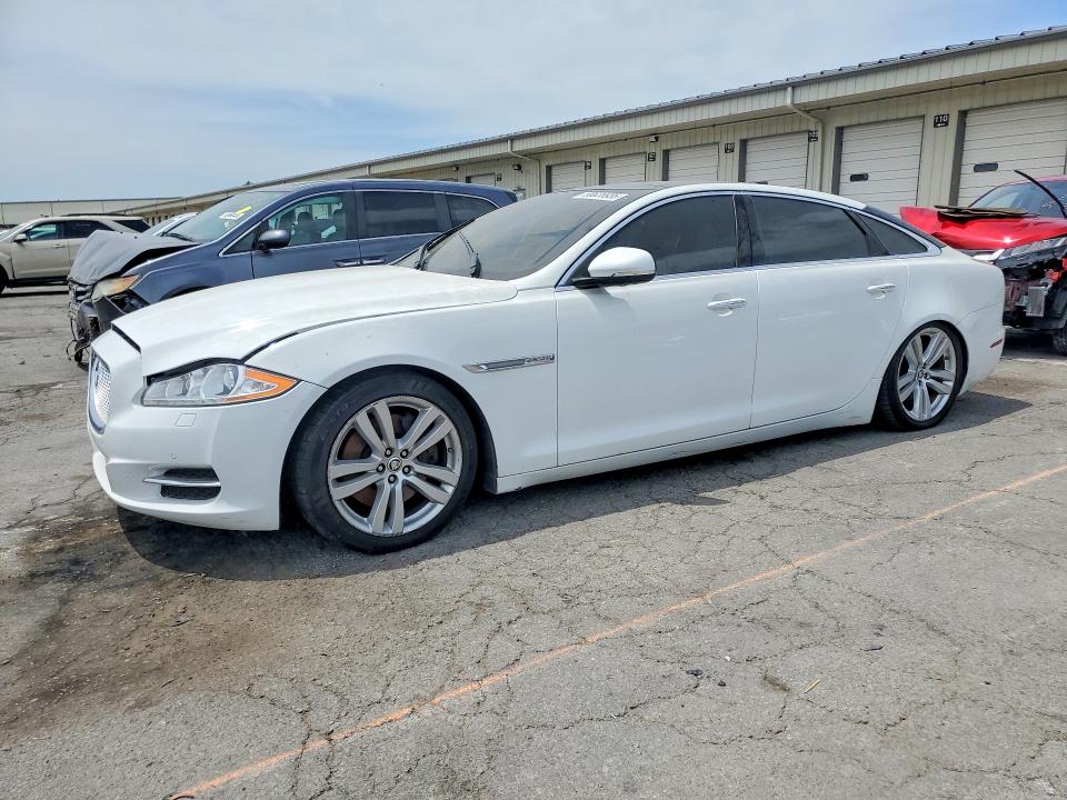 2013 Jaguar VIN SAJWA2G10DLV53383 COPART salvage auction — SIDE, Ky - Certificate Of Title, sold $575 on 2026-07-20 (photo 1)