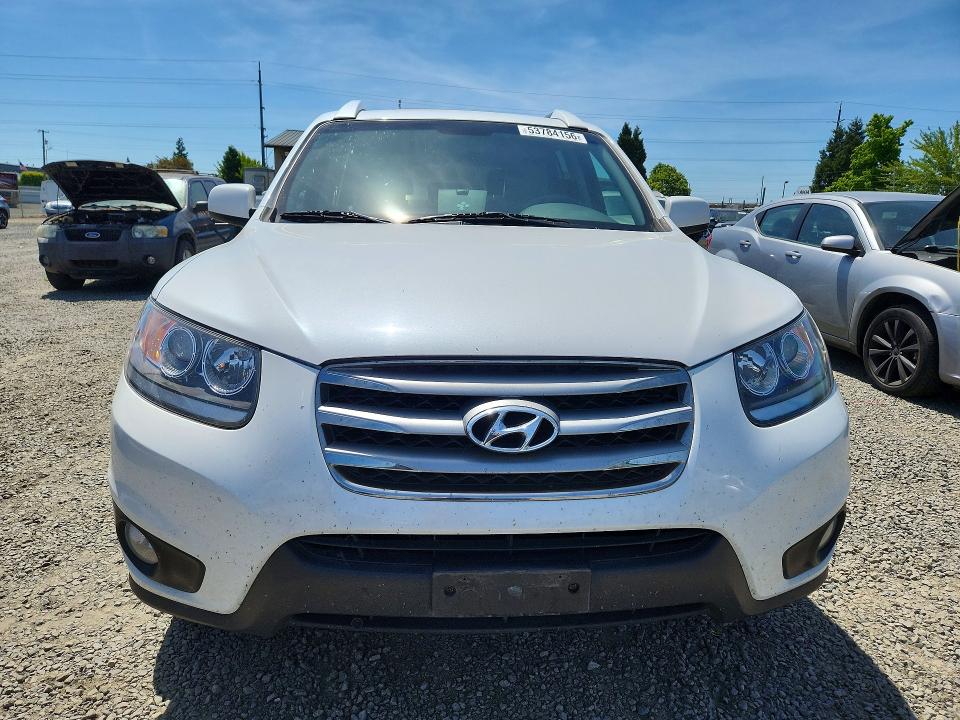 2012 Hyundai Santa fe VIN 5XYZHDAG1CG132346 COPART salvage auction — SIDE, Or - Salvage Title Certificate, sold $775 on 2026-07-07 (photo 5)