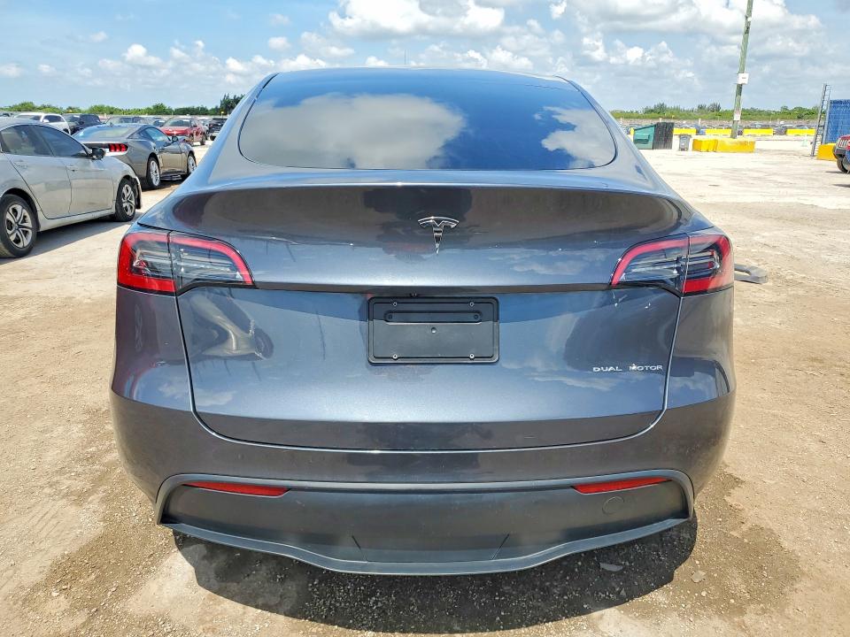 2023 Tesla Model y VIN 7SAYGDEE5PF629696 COPART salvage auction — FRONT END, FL - CERTIFICATE OF TITLE, sold $7,200 on 2026-07-16 (photo 6)