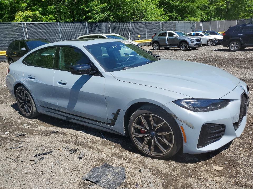 2024 BMW VIN WBY83FB08RFT23652 COPART salvage auction — MINOR DENT/SCRATCHES, Salvage Title, sold $23,200 on 2026-07-17 (photo 4)