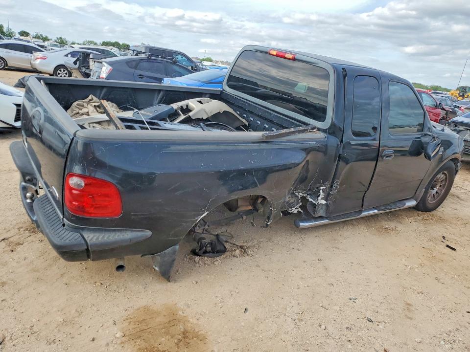 2003 Ford F-150 lightning VIN 1FTRX07W33KD10259 COPART salvage auction — SIDE, Tx - Salvage Vehicle Title, sold $450 on 2026-07-02 (photo 3)