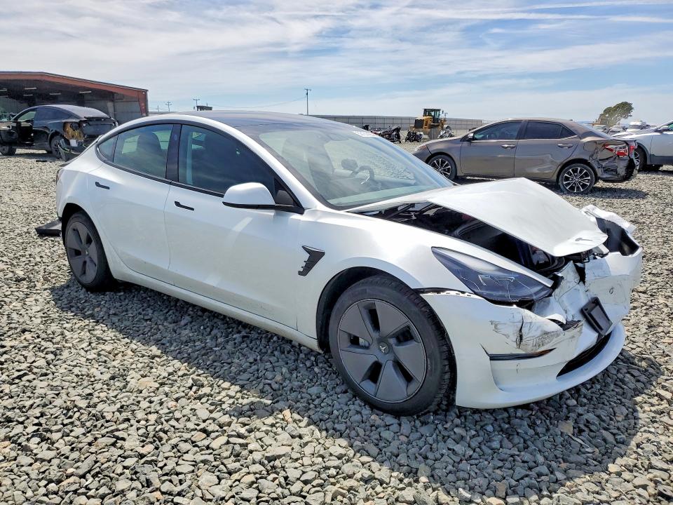 2023 Tesla Model 3 VIN 5YJ3E1EA9PF506430 COPART salvage auction — REAR END, Ca - Salvage Certificate, sold $4,500 on 2026-07-13 (photo 4)