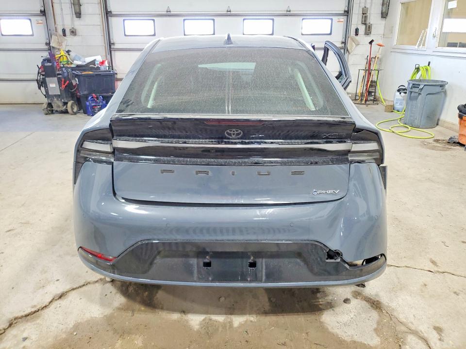 2025 Toyota Prius VIN JTDACACU0S3049264 COPART salvage auction — SIDE, Mn - Cert Of Title-Salvage, sold $9,700 on 2026-07-07 (photo 6)