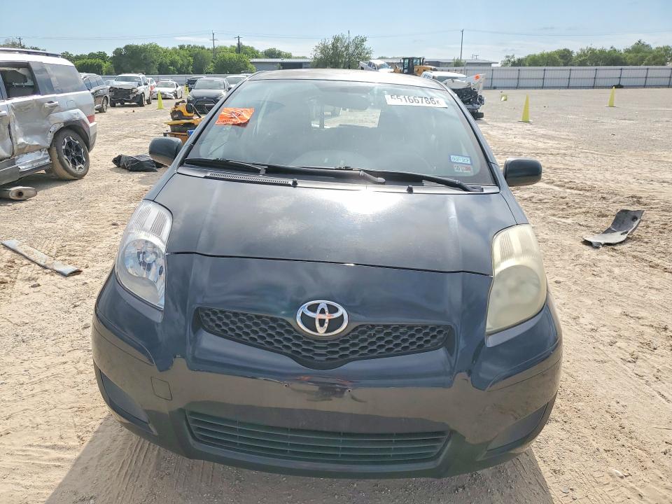 2011 Toyota Yaris VIN JTDKT4K30B5330516 COPART salvage auction — REAR END, Tx - Salvage Vehicle Title, sold $1,000 on 2026-07-16 (photo 5)