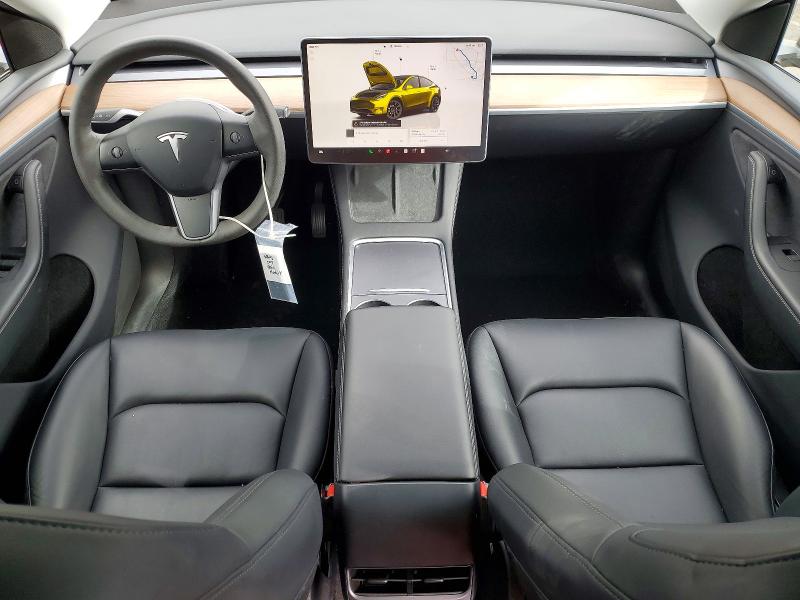 2023 Tesla Model y VIN 7SAYGDEE3PA178068 COPART salvage auction — SIDE, Salvage Title, sold $12,100 on 2026-07-29 (photo 8)