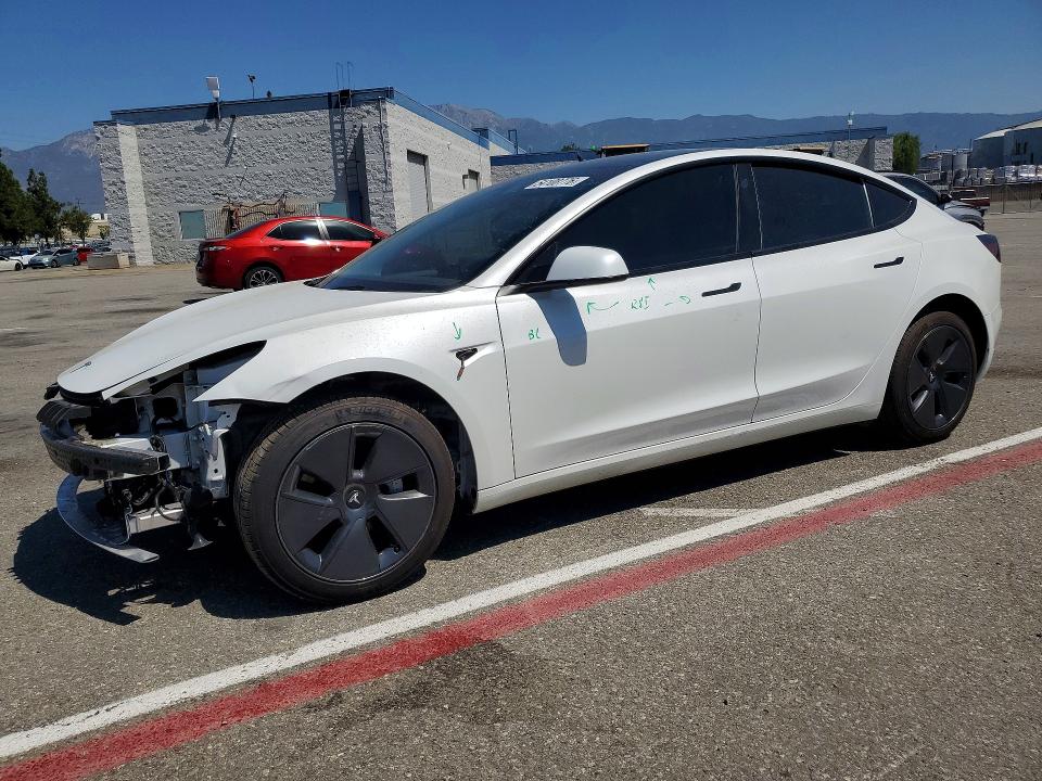 2023 Tesla Model 3 VIN 5YJ3E1EA0PF558593 — COPART salvage auction photo