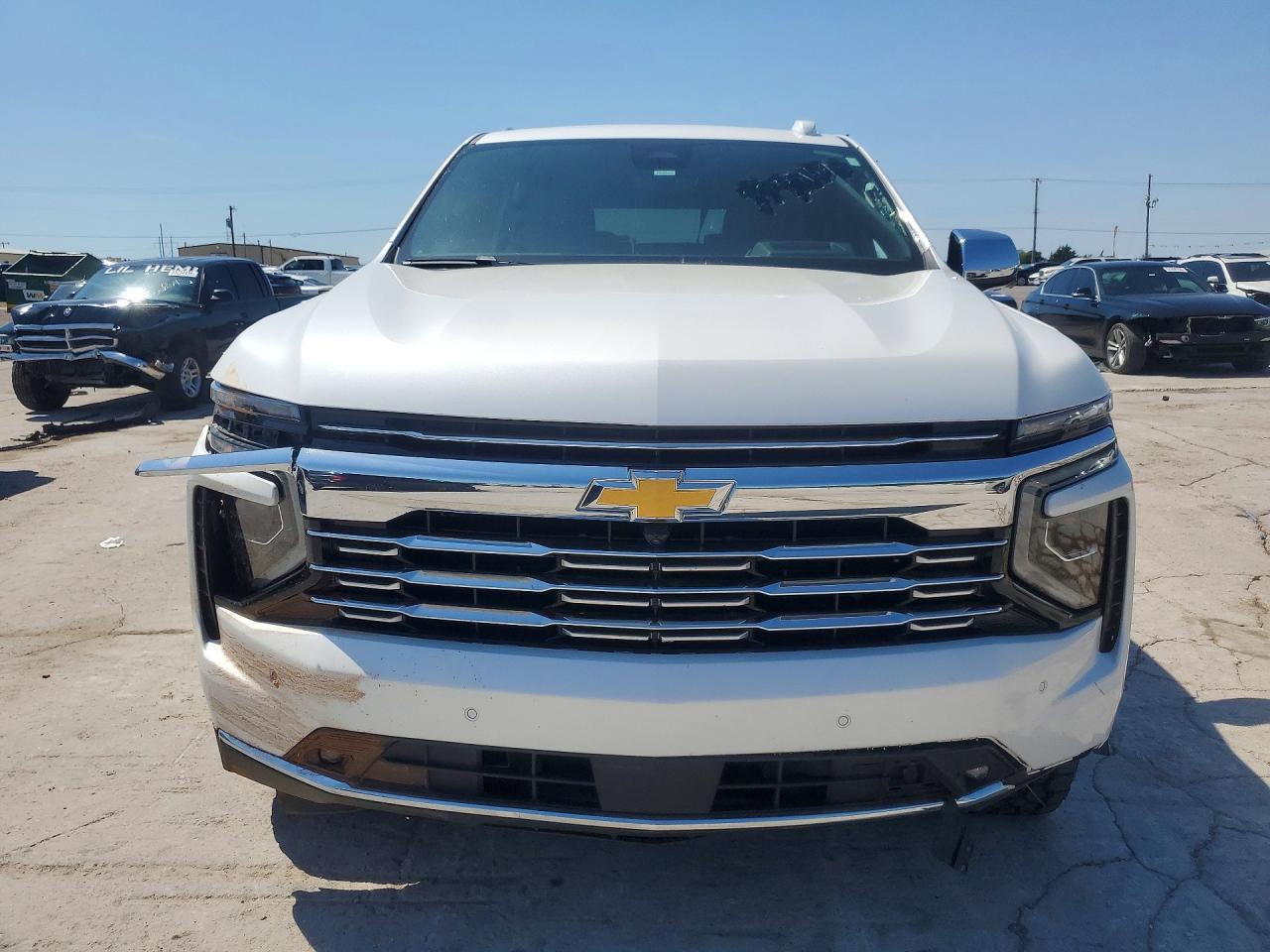 2025 Chevrolet Tahoe VIN 1GNS6SR82SR246680 COPART salvage auction — Side, OK - CERT OF TITLE-SALVAGE, sold $37,500 on 2026-06-30 (photo 5)