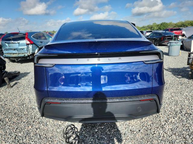 2026 Tesla Model y VIN 7SAYGDED5TF524612 COPART salvage auction — SIDE, Fl - Cert Of Title Slvg Rebuildable, sold $22,300 on 2026-07-10 (photo 6)