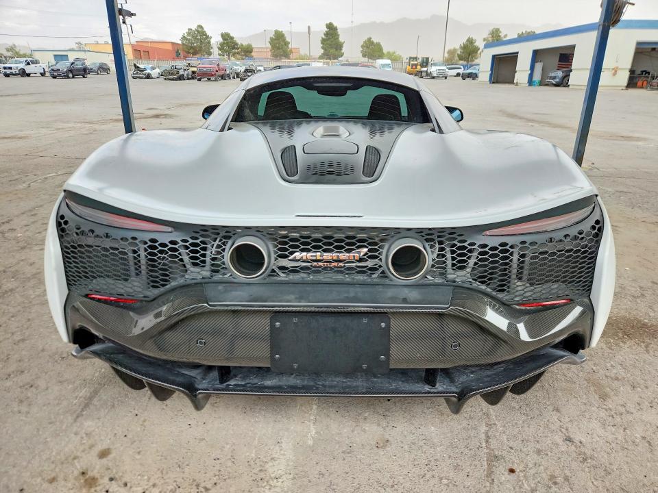 2023 Mclaren VIN SBM16AEA4PW000494 COPART salvage auction — VANDALISM, Tx - Salvage Vehicle Title, sold $115,000 on 2026-08-27 (photo 6)