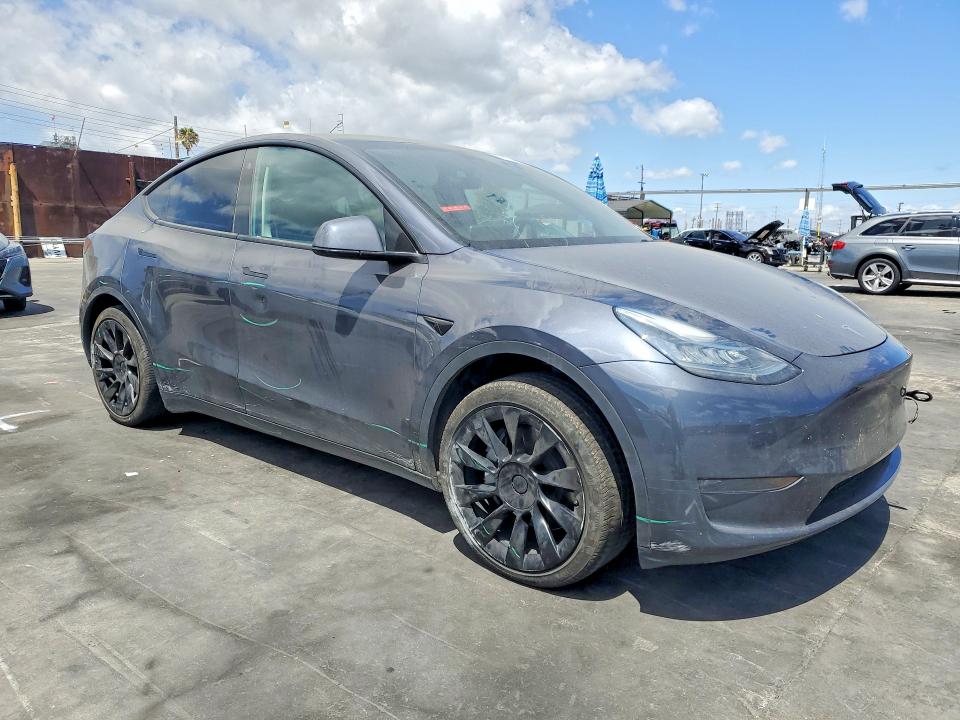 2023 Tesla Model y VIN 7SAYGDEE8PA113412 COPART salvage auction — MINOR DENT/SCRATCHES, Ca - Salvage Certificate, sold $14,100 on 2026-07-15 (photo 4)