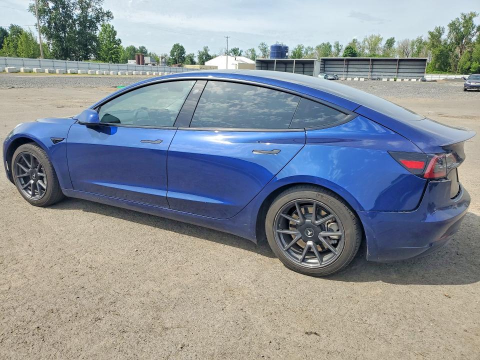2023 Tesla Model 3 VIN 5YJ3E1EA5PF677577 COPART salvage auction — SIDE, Or - Salvage Title Certificate, sold $8,200 on 2026-07-22 (photo 2)