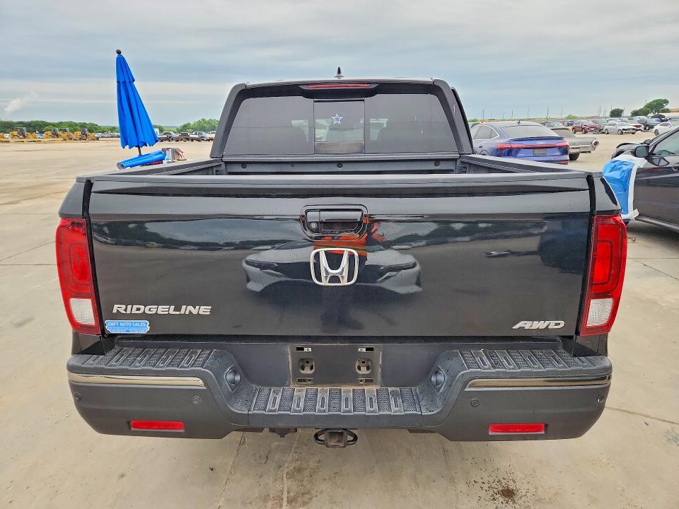 2019 Honda Ridgeline VIN 5FPYK3F8XKB017721 COPART salvage auction — SIDE, TX - SALVAGE VEHICLE TITLE (P), sold $6,600 on 2026-07-02 (photo 6)