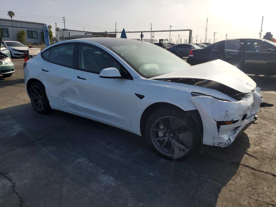 2023 Tesla Model 3 VIN 5YJ3E1EAXPF479254 COPART salvage auction — FRONT END, Ca - Salvage Certificate, sold $5,200 on 2026-07-22 (photo 4)