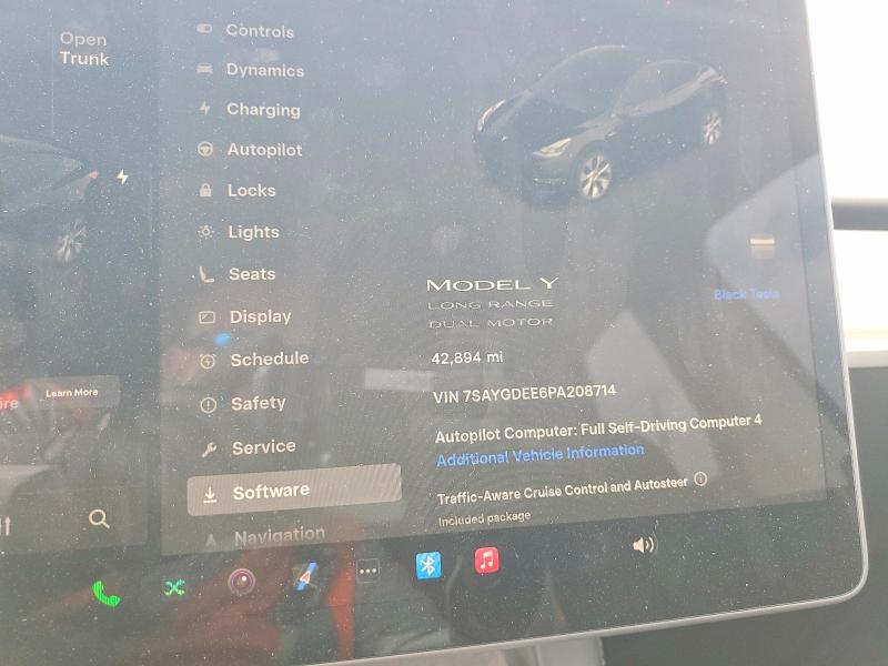2023 Tesla Model y VIN 7SAYGDEE6PA208714 COPART salvage auction — REAR END, Ca - Salvage Certificate, sold $11,700 on 2026-07-20 (photo 9)