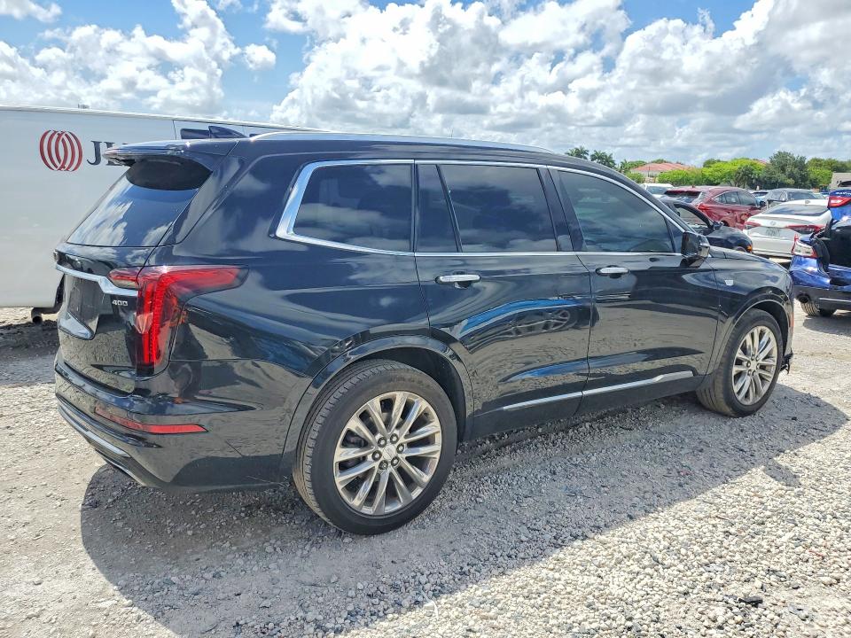 2021 Cadillac Xt6 VIN 1GYKPCRS0MZ206618 COPART salvage auction — SIDE, Fl - Cert Of Title Slvg Rebuildable, sold $8,600 on 2026-08-21 (photo 3)