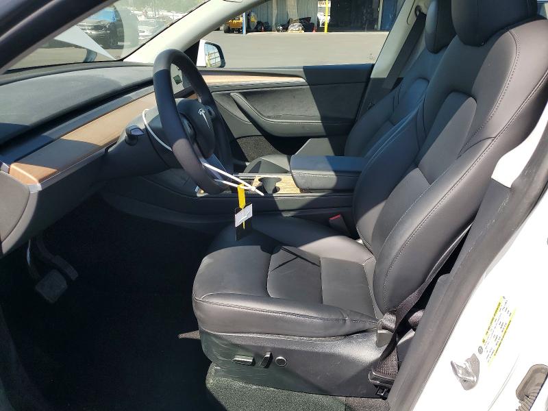 2023 Tesla Model y VIN 7SAYGDEE5PA149347 COPART salvage auction — REAR END, Ca - Salvage Certificate, sold $14,100 on 2026-07-06 (photo 7)
