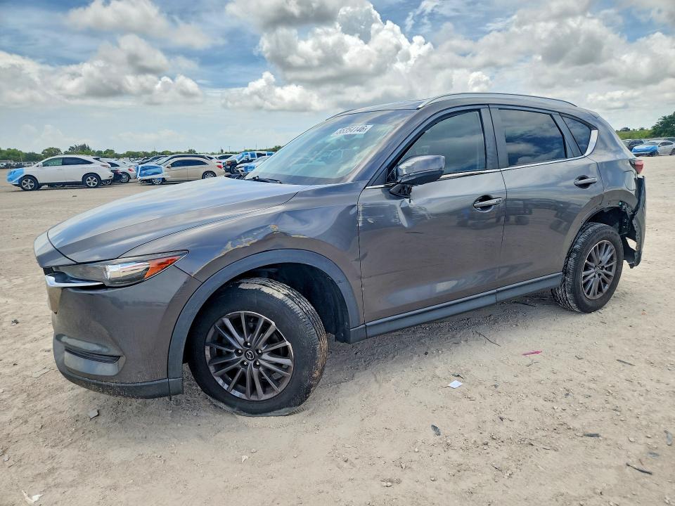 2020 Mazda Cx-5 VIN JM3KFACM7L1863038 COPART salvage auction — SIDE, Fl - Cert Of Title Slvg Rebuildable, sold $6,300 on 2026-07-16 (photo 1)